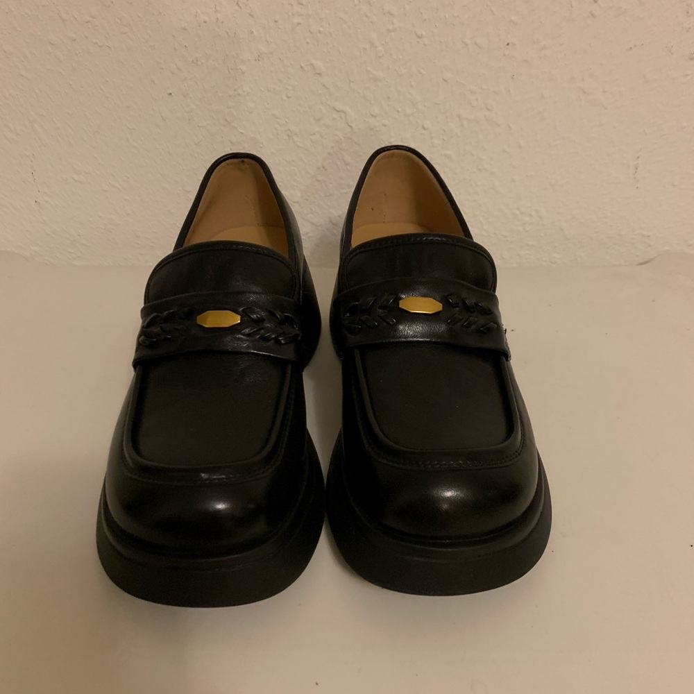Elegant Black Leather Loafers with Gold Accent